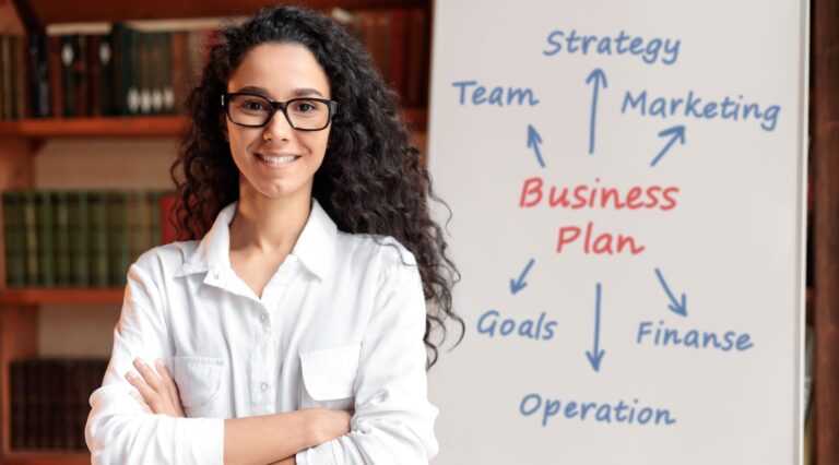 confident-businesswoman-in-glasses-posing-near-whi-2026-01-08-23-16-40-utc